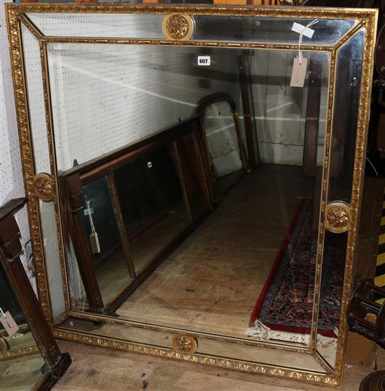 Gilt-framed wall mirror with marginal plates